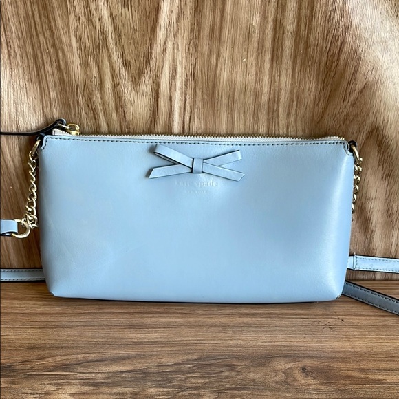 kate spade Handbags - Pre-owned Kate Spade Light Blue Leather Crossbody Bag with Bow